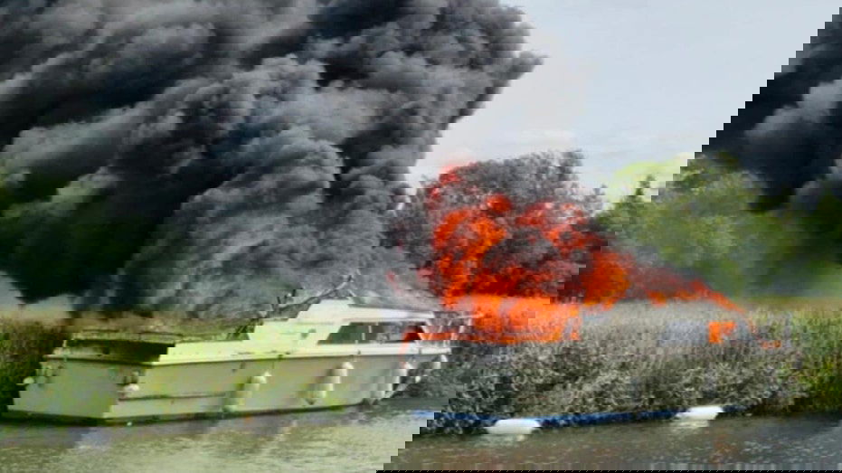 Boat explodes on the river and a peaceful vacation walk turns into a desperate rescue